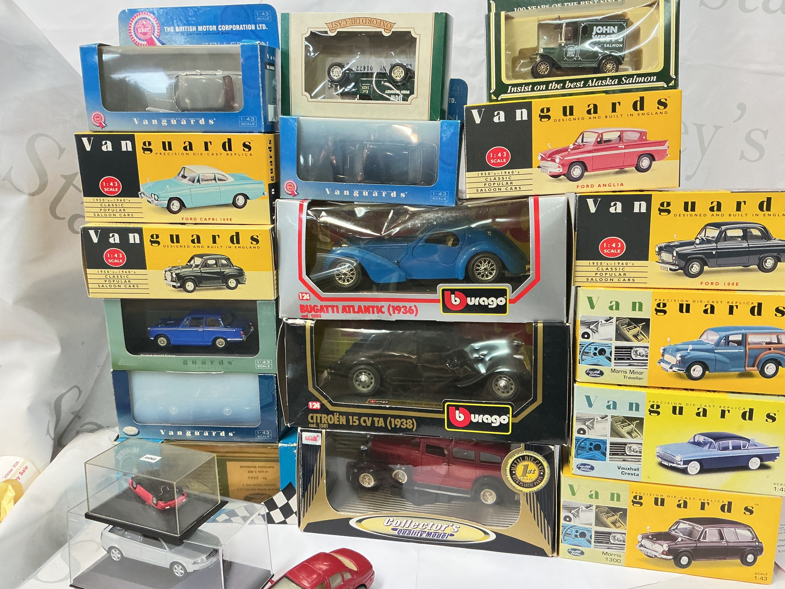 A Collection Of Boxed Vanguard's, Burago, And Loose Diecast. No Reserve.