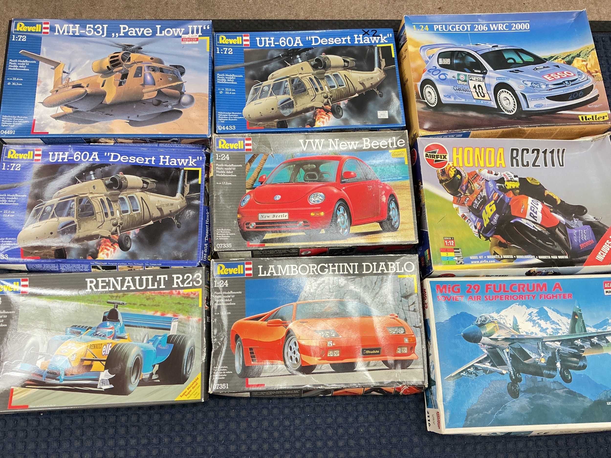 A Collection Of Boxed Plastic Model Kits Including Airfix, Revell, Heller, Etc.