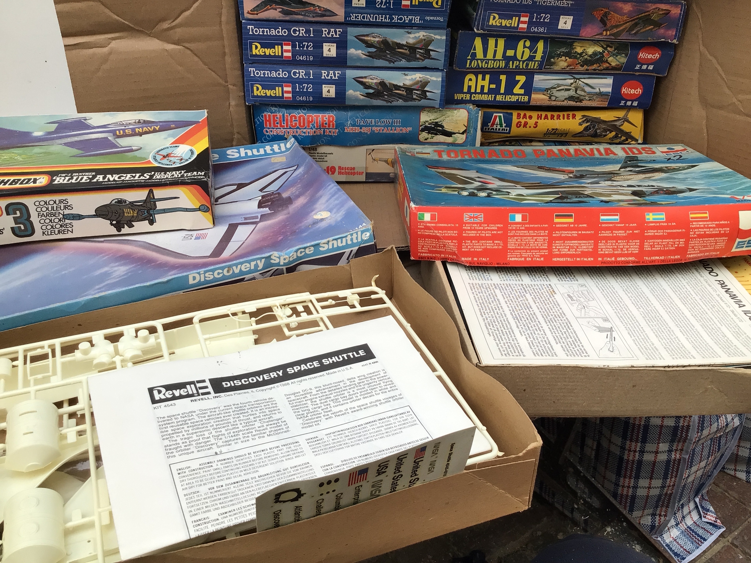 A box containing a collection of boxed model aircraft kits by various manufacturers including Revell, Kitech, Matchbox etc in varying scales.  No reserve.