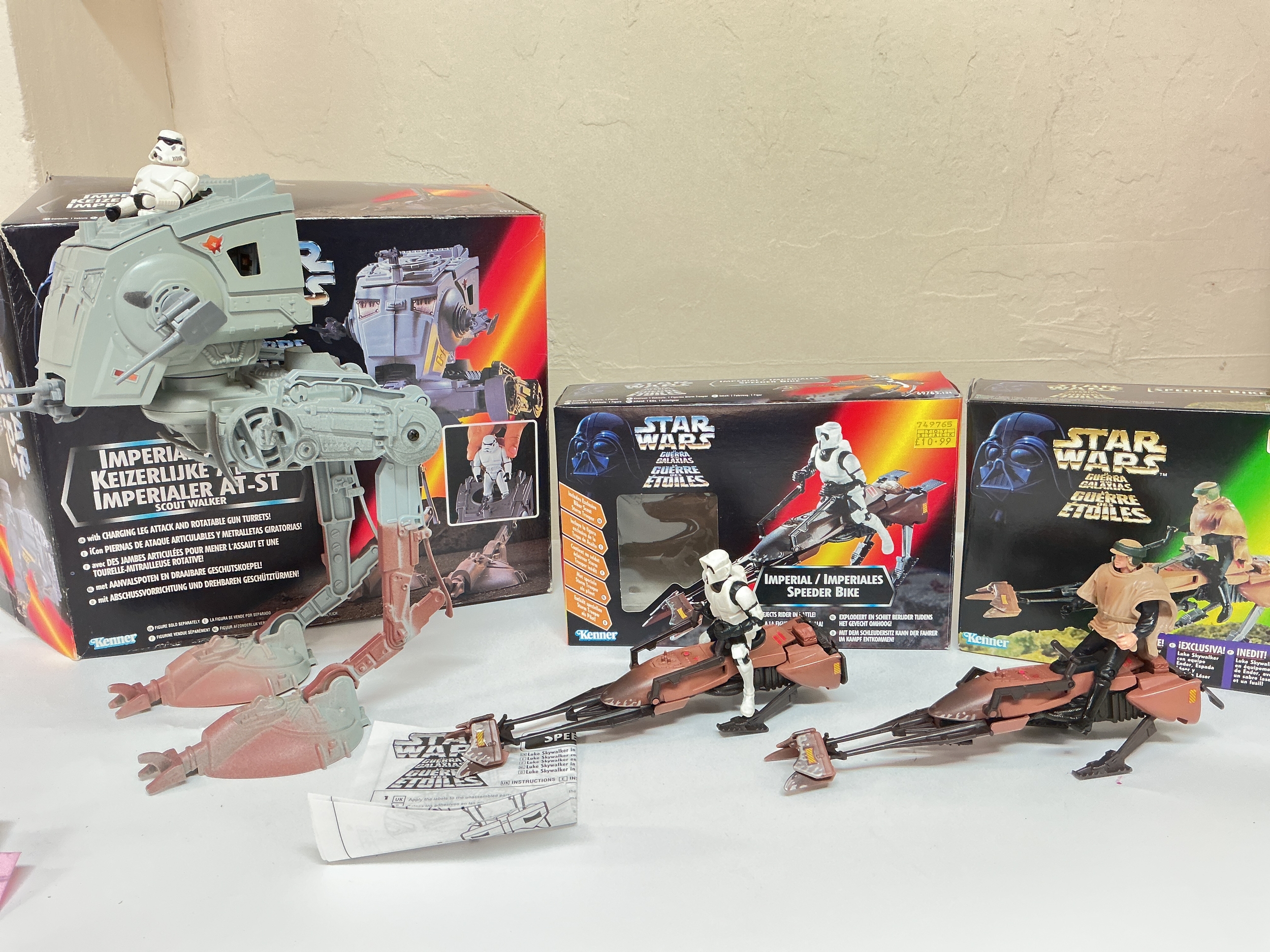 A Collection Of Boxed Kenner 1990s Star Wars Toys Including Speeder Bikes And AT-ST (Parts Missing). No Reserve.