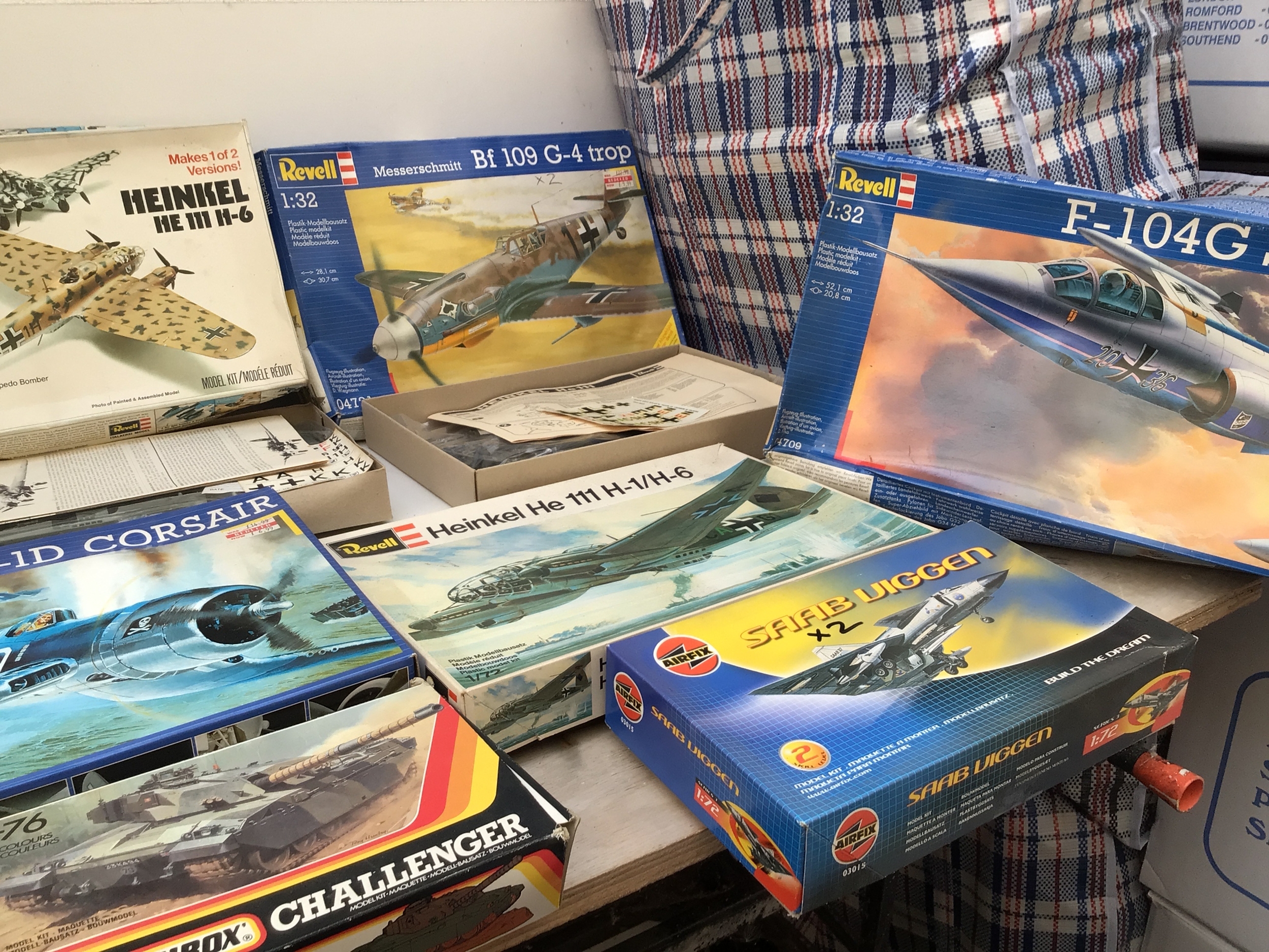 A bag containing a collection of boxed model kits comprising of aircraft, some boxes contain more than one model (unchecked). Manufacturers include Revell, Airfix, Matchbox etc.  various scales.  No reserv