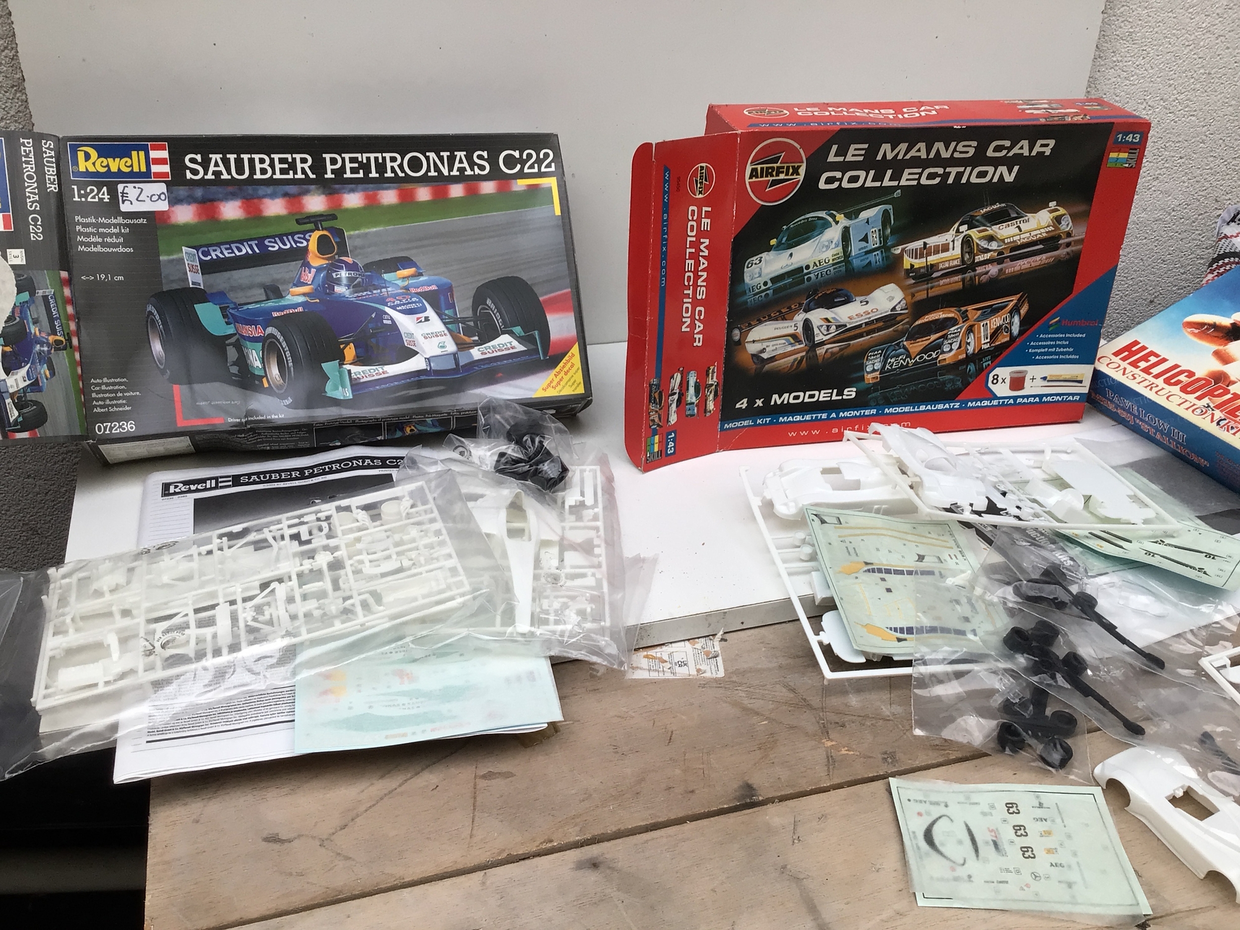 A collection of boxed model kits featuring aircraft and cars, manufacturers include Revell, Airfix, Tamiya etc in various scales. Some boxes may contain more than one kit.  No reserve.