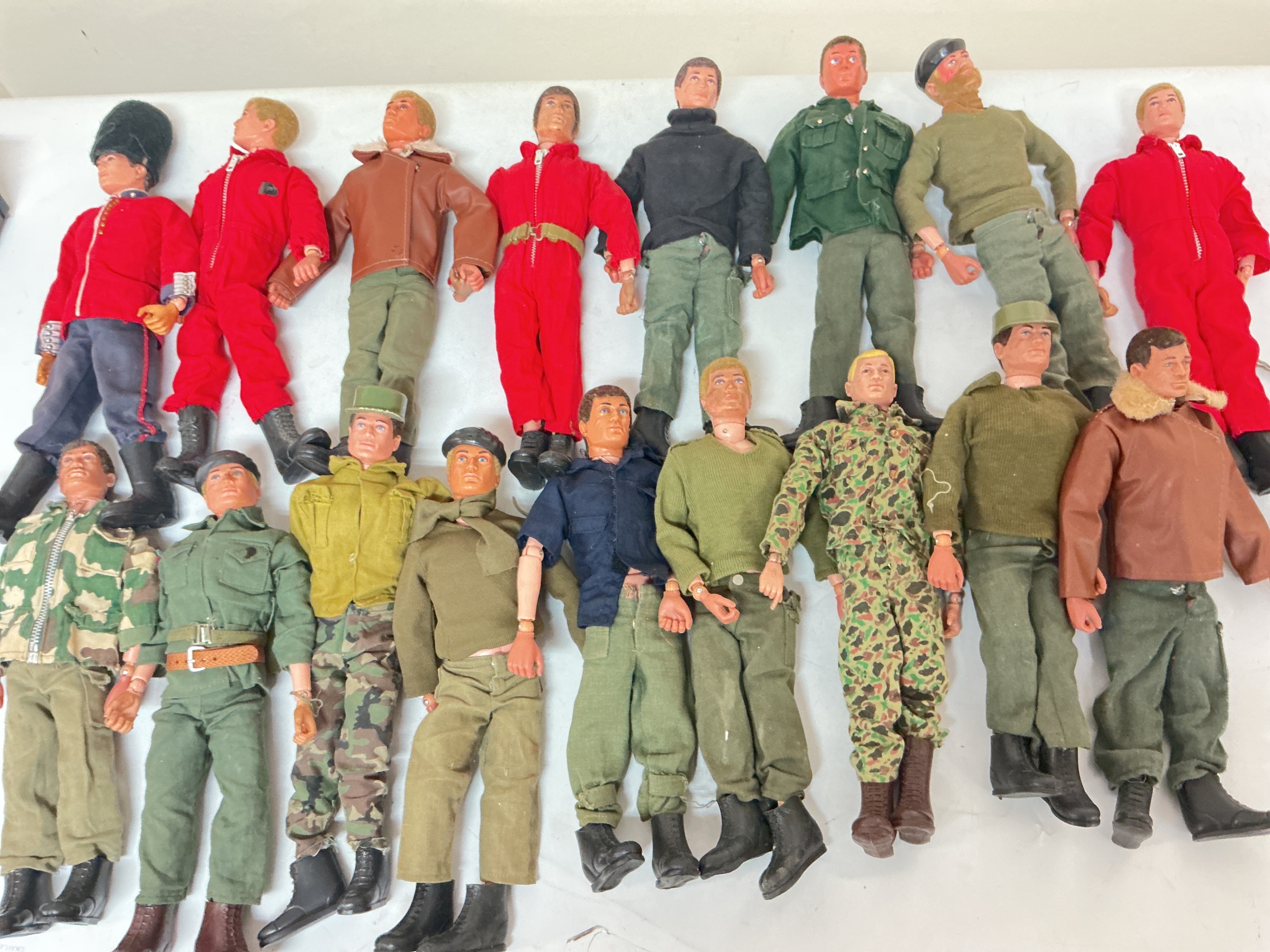 A Collection Of 17 Vintage Action Men, mostly with new Hands, 2 Vintage Boxes And Some Accessories 
