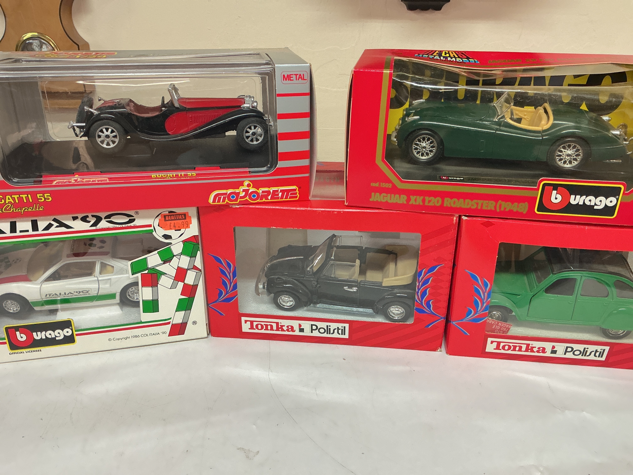A Box Containing Boxed And Loose Diecast Including Polistil, Burago, Matchbox Box Etc, No Reserve.