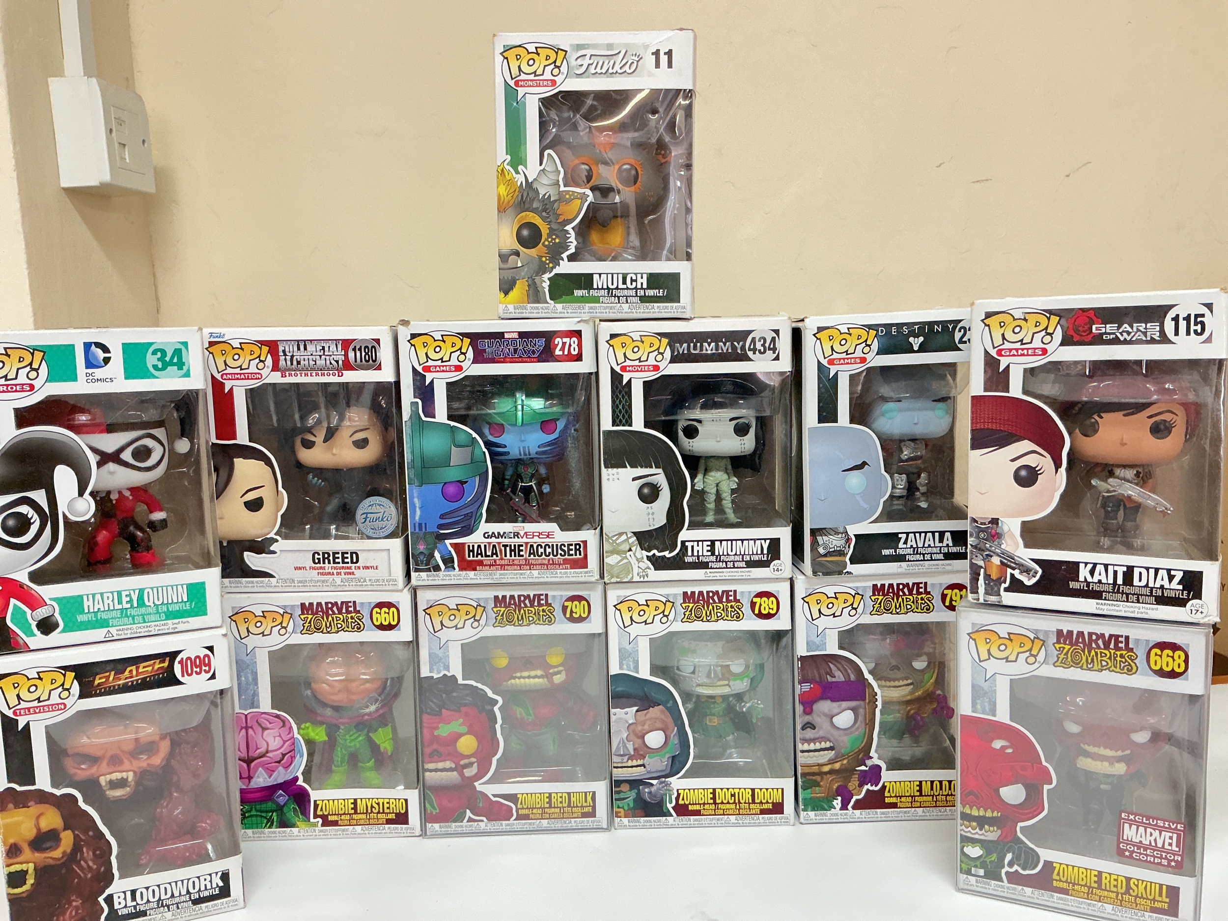 A. Collection Of 13 Boxed Funko Pop Figures.