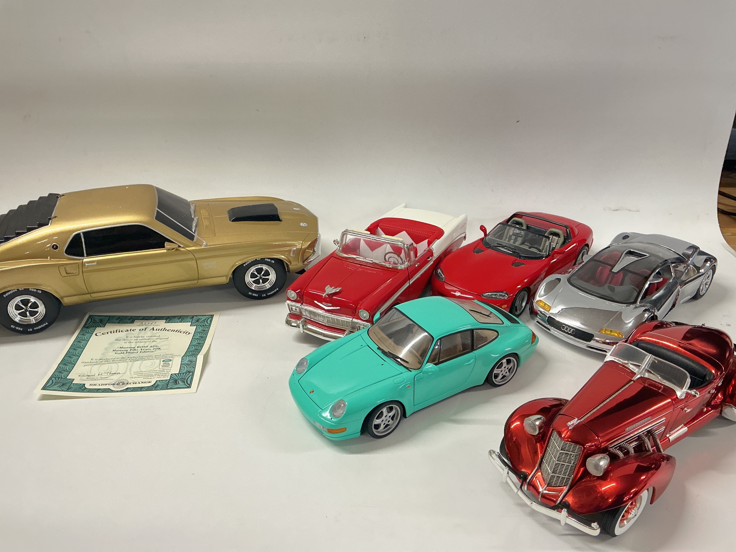A Collection Of Loose 1/18 Scale Diecast Cars ars And A Bedford Exchange 1/12 Scale Mustang Boss429, Limited Edition.