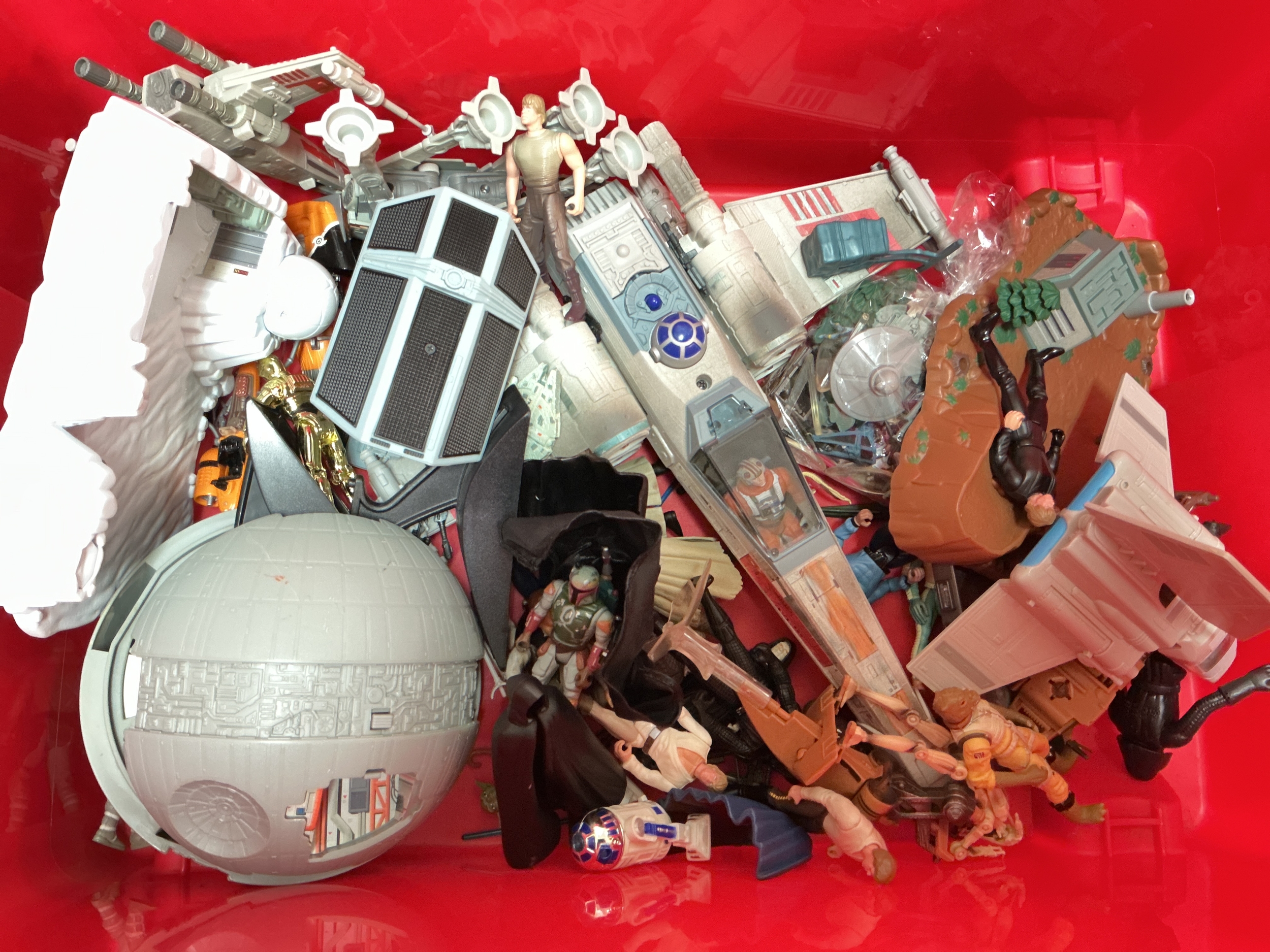 A Box Containing Loose 1990s Star Wars Figures And Microsoft Machines Including An X-Wing.