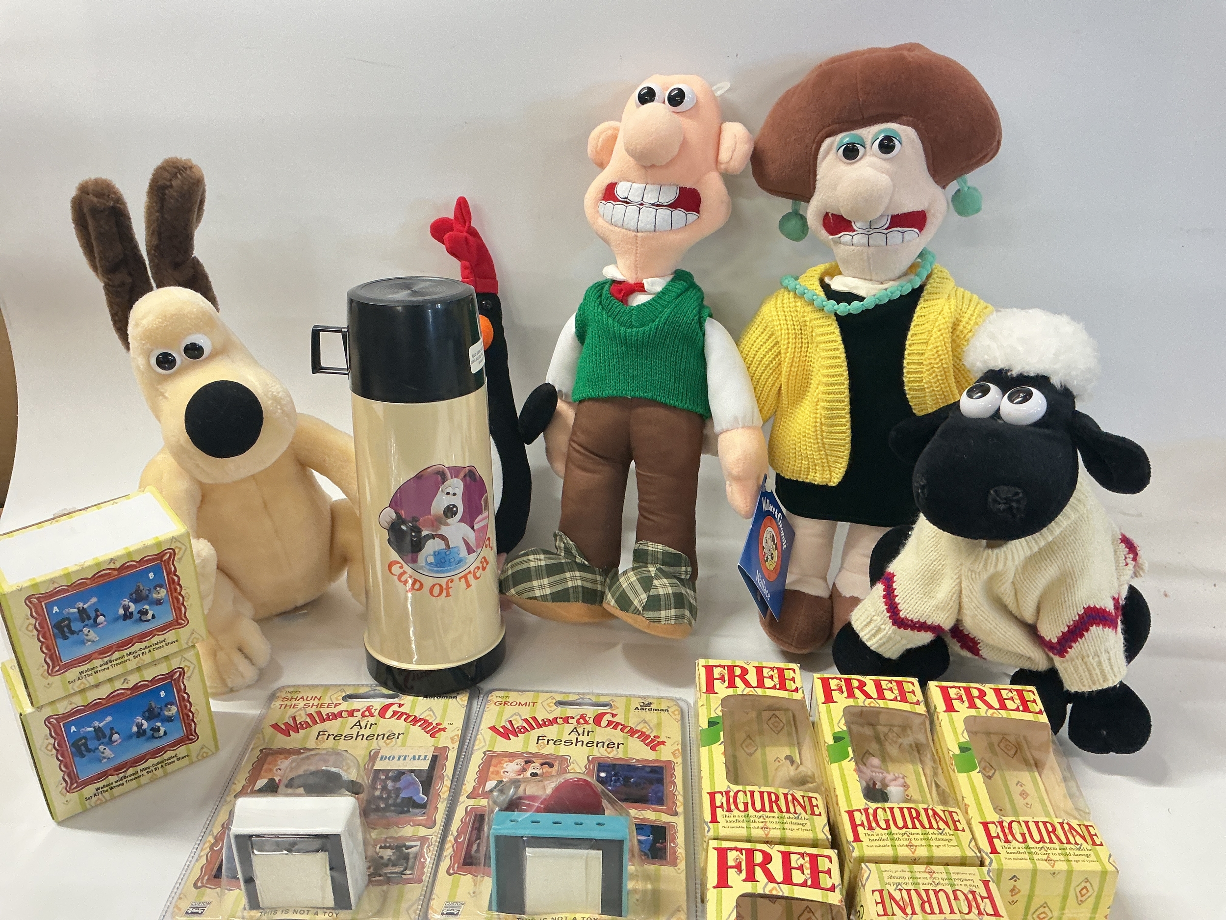 A Collection Of Wallace And Gromit Toys And ephemera.