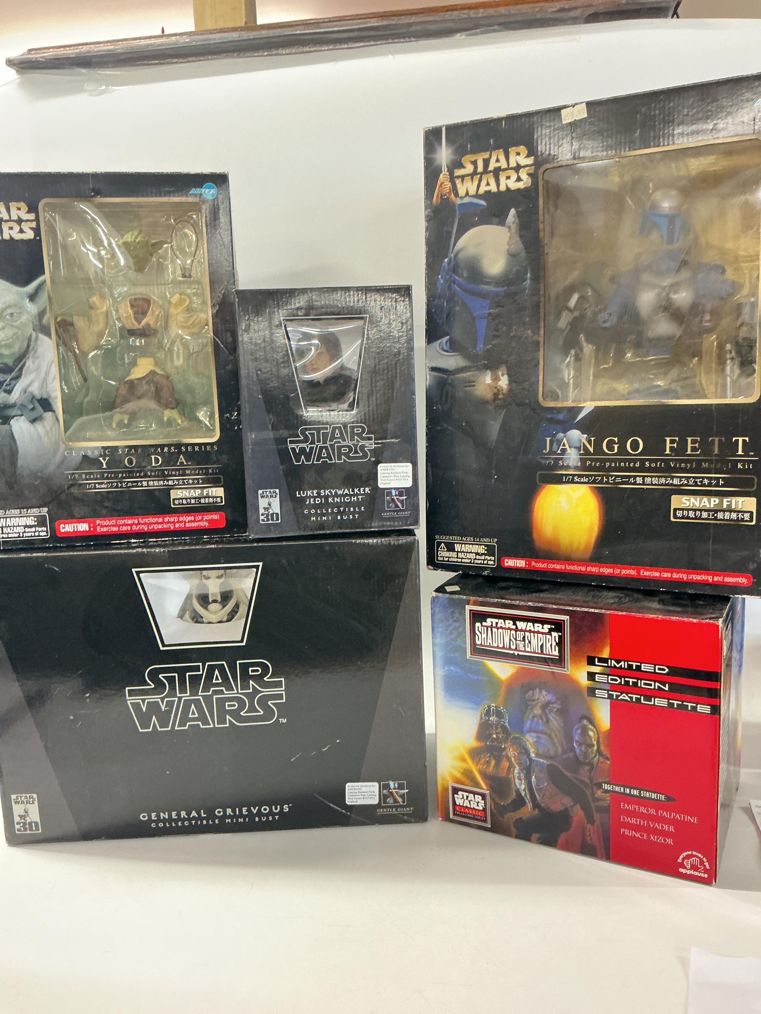 A Collection Of Boxed Star Wars Mini Busts And Snap Fit Kits. No Reserve.