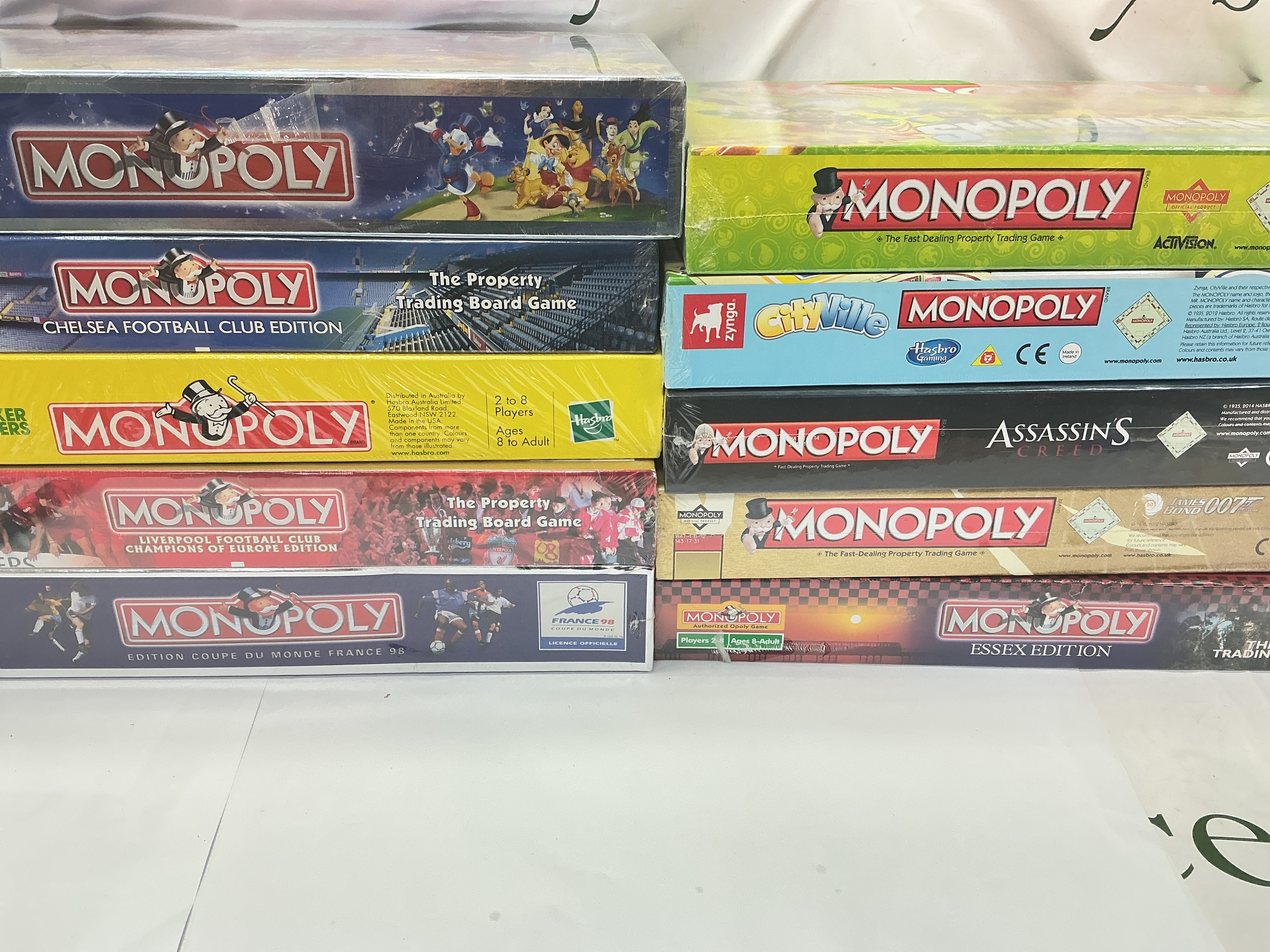 A Collection Of Boxed And Sealed Monopoly Set (1 Opened) including skylanders, Disney, Essex, cityille, Liverpool, James Bond Etc.