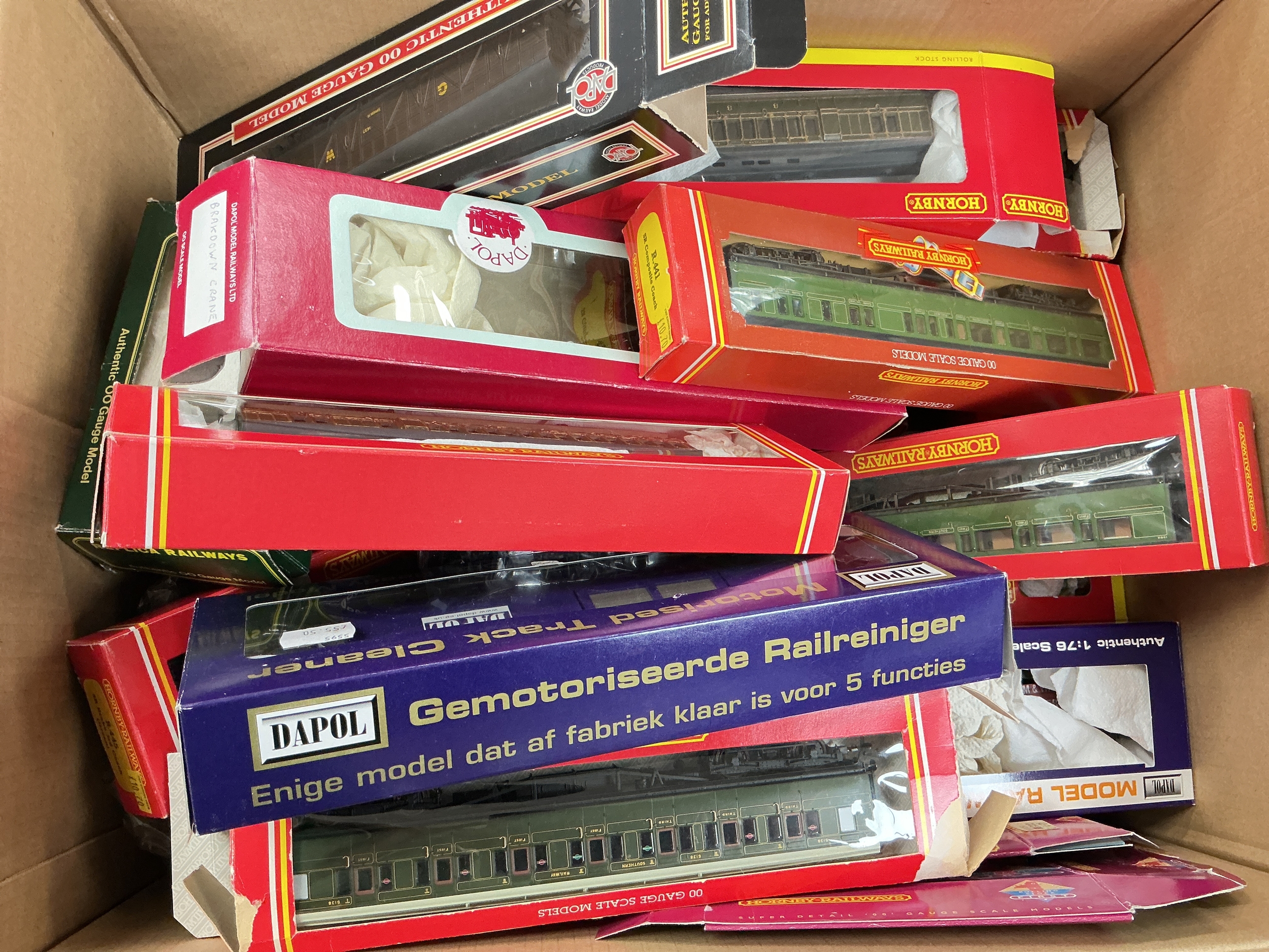 A Box Containing Boxed And Loose 00 Gauge Wagons Coaches Etc. Also 2 Locos No Reserve.