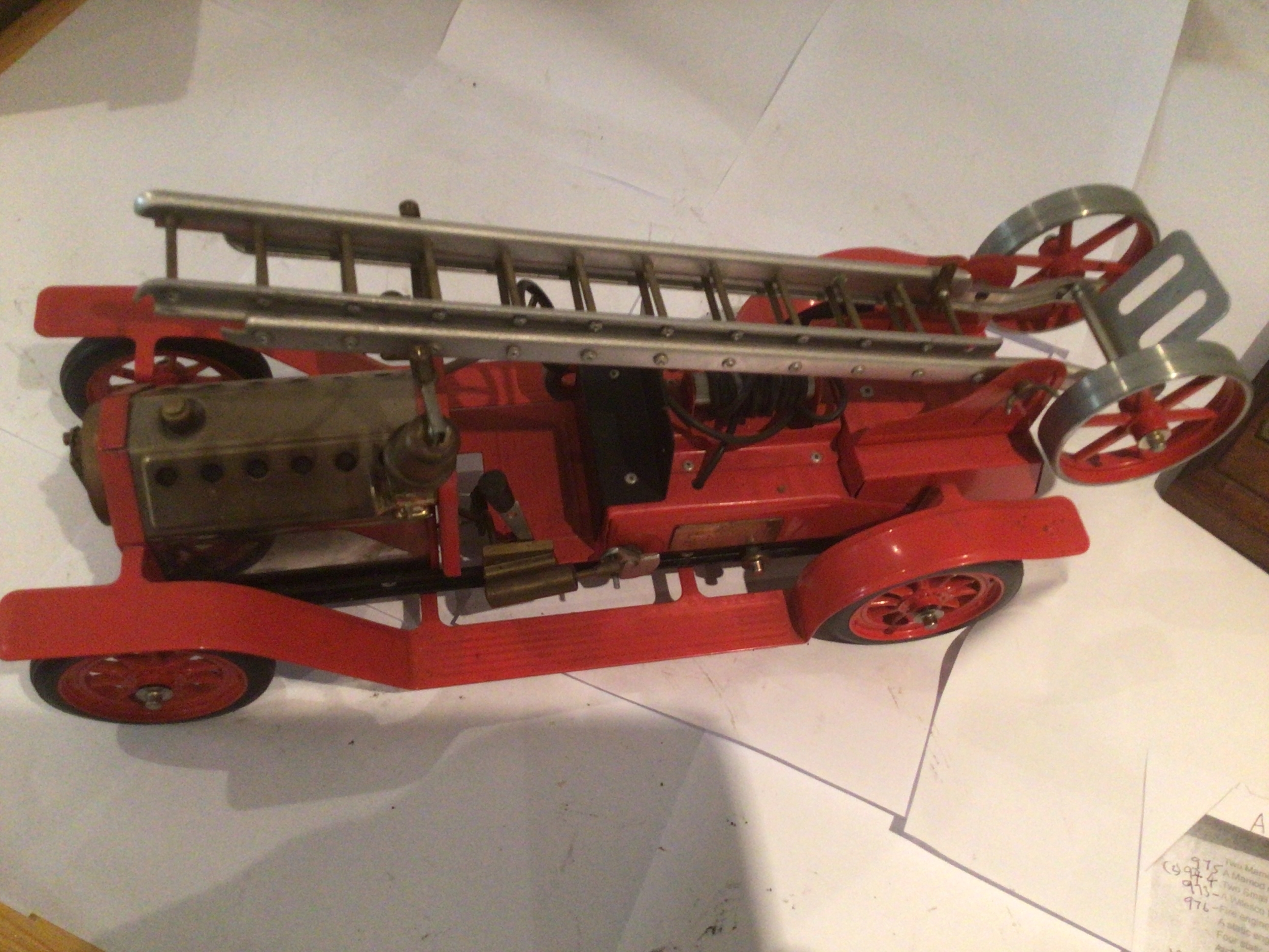 A model steam powered vintage fire engine by Mamod, named STEVEN.  Untested
