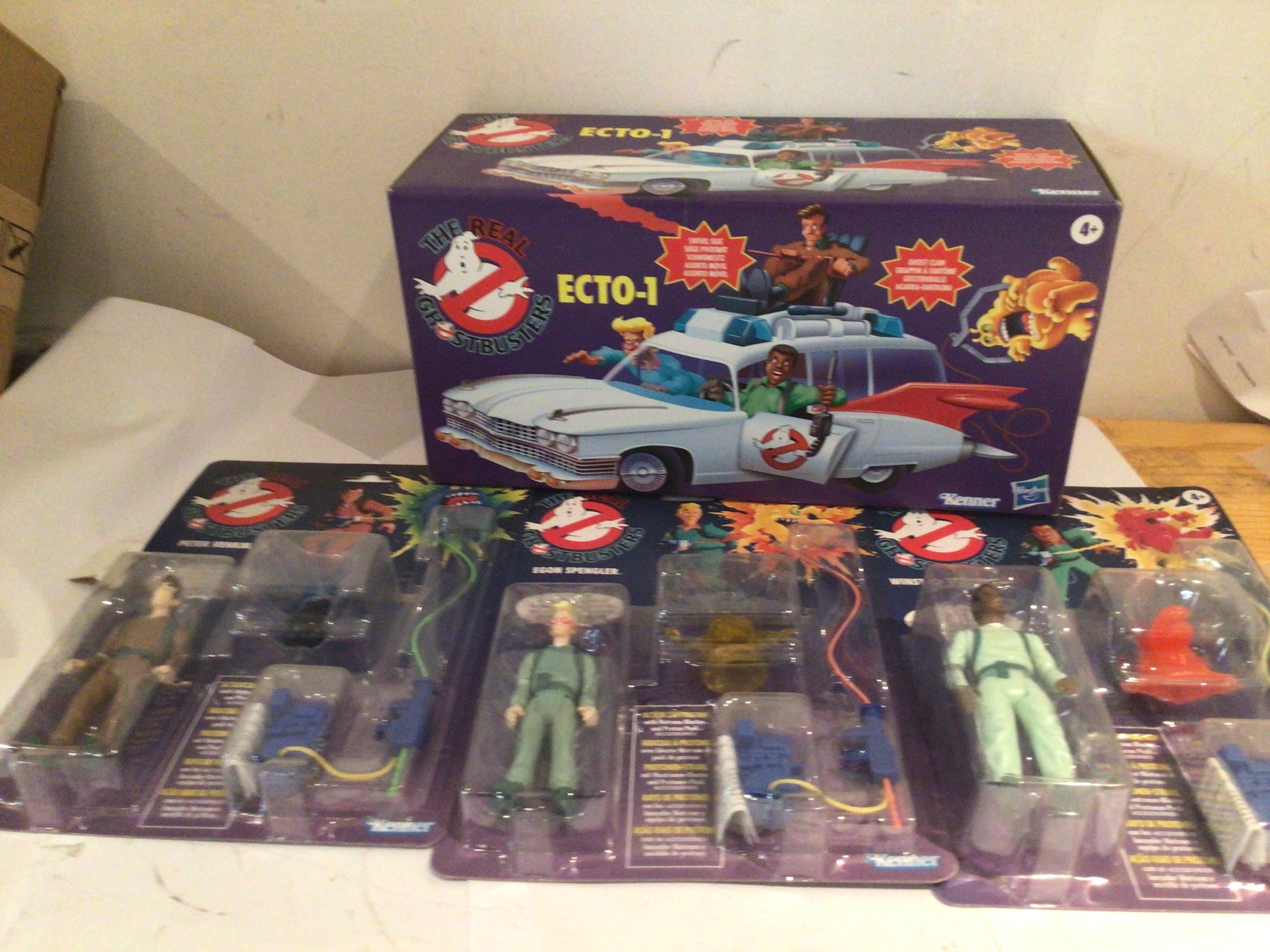 A collection of Ghostbusters figures including Action figures and ECTO-1.  All unopened in their original packaging.  No reserve