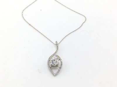 A 9ct white gold necklace with CZ pendant.
2.94g