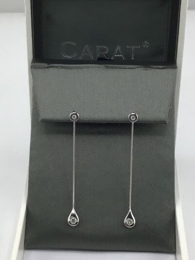 A pair of 18cart white gold modern design long drop earrings set with brilliant cut diamonds weight 2.2g