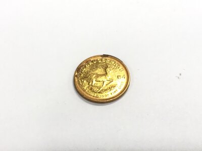 A loose 1/10th 1984 krugerrand coin. Approx 3.33 grams