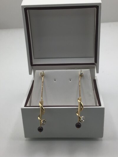 A Pair of unusual modern design 585 yellow gold long drop earrings with white stone CZ and red stone cabochon 6.2g approximately.