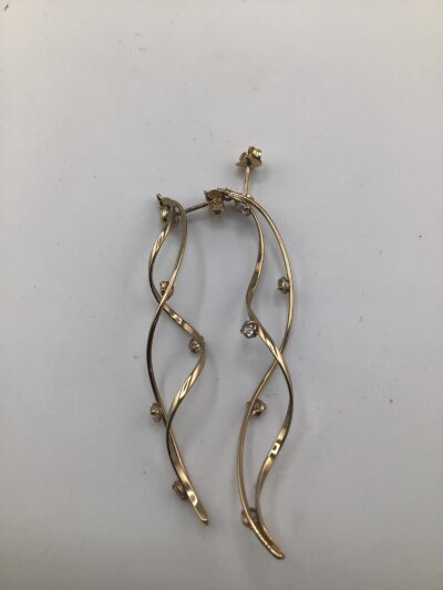 A Pair of 9cart gold long drop spiral earrings set with small CZ stones weight 3G