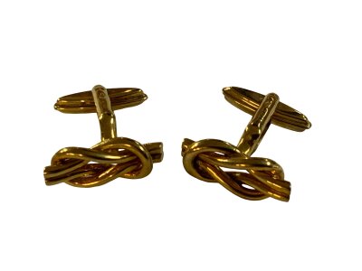 A pair of 9ct gold lovers knot design cufflinks. 9.66g.
