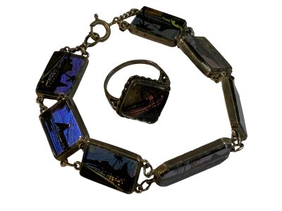 A vintage 900 grade silver bracelet with butterfly wing decoration.