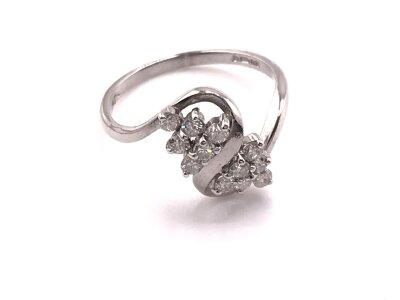 A 9ct white gold ring set with diamonds. Size M and 2.06g