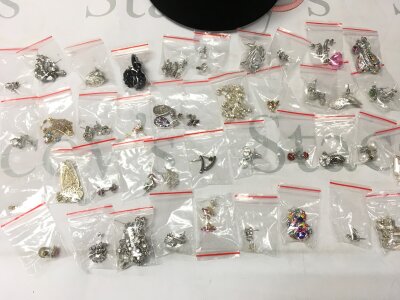 A collection of silver earrings including some non silver examples