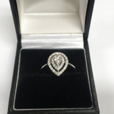 A 14ct white gold diamond cluster ring, approx 2.4g and approx size N. Shipping category A.
