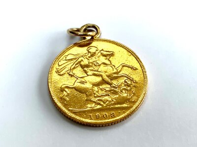 A full 1908 Edward VII sovereign with soldered link.