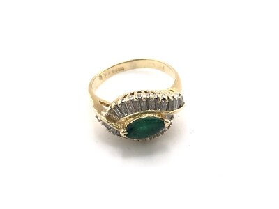 A 14ct gold emerald and diamond set ring. Size K and 3.56g