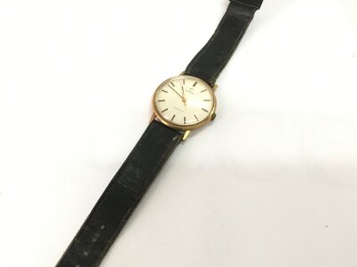 An omega wrist watch