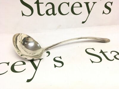 A large silver George V 1922 Birmingham ladle, 225g total weight