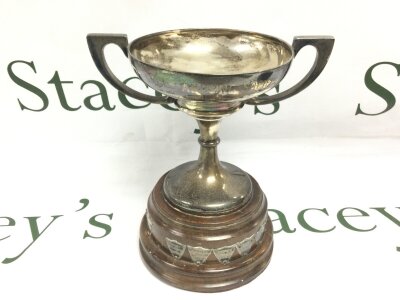 A silver hallmarked  trophy cup, inscription reads Sages Angling Society Trophy for the Best Bream. 20cm tall