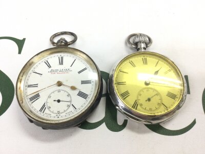 Two silver hallmarked cased button wind pocket watches. Not seen working. Total weight 170g
