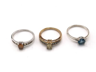 Two 9ct gold rings 4.75g and a 925 silver
Sizes N to N 1/2