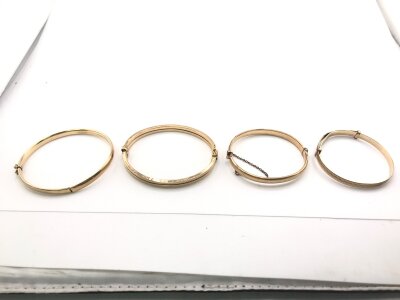 2 9ct gold bangles 13.73g and 2 9ct metal core bangles 12.63g