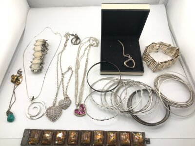 A collection of assorted silver a white metal jewellery.