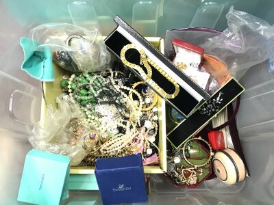 A large collection of assorted costume jewellery including silver items.