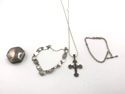 A collection of assorted silver items including two bracelets a necklace and a silver box.