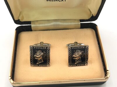 A pair of Penny black cufflinks in box.