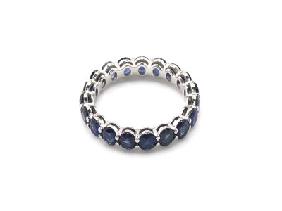 A platinum full eternity ring set with oval sapphires approx 3.50ct size Q