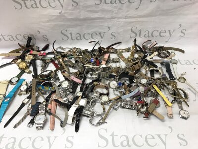 A large collection of assorted fashion watches