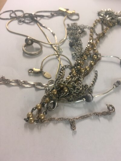 A Collection of silver jewellery including necklaces bracelet and ring .