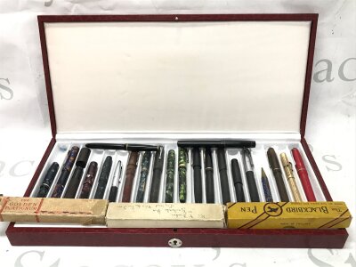 A pen presentation case containing a collection of fountain pens , boxed pens and pencils (3) fair condition. 14ct nibs
