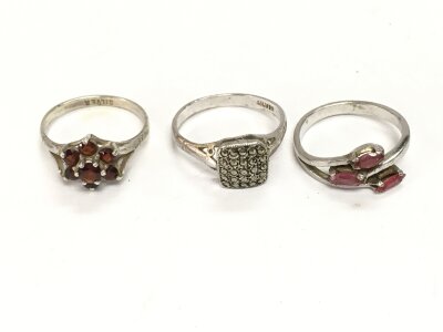 Three silver rings of various designs. 6.77g
