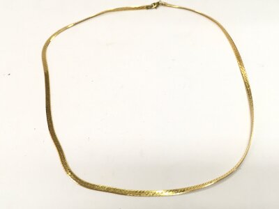 A 9ct gold flat necklace. 12g