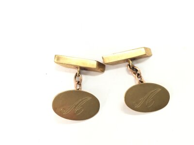 A pair of 9ct gold cufflinks with A initial. 4.55g