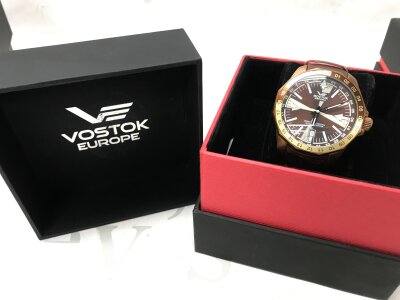 A boxed Vostok Espona automatic gents watch, seen working