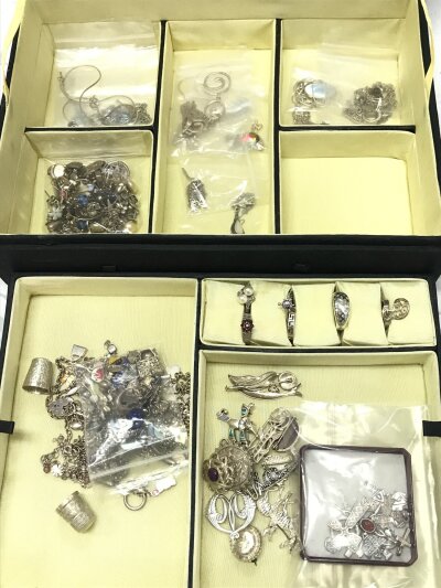 A Collection of silver jewellery including bracelets, charms, rings etc