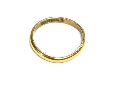 A 22ct gold wedding band. Size I and 1.80g