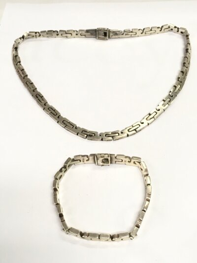 A sterling silver H design necklace and bracelet. 125g total weight approximately
